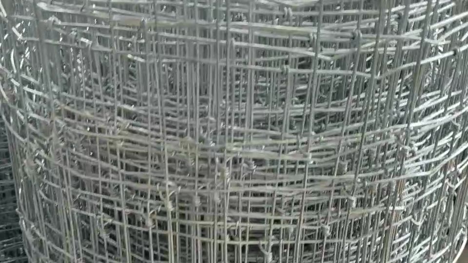 Close view of completed galvanized fixed knot fence rolls at KUNYU FENCING