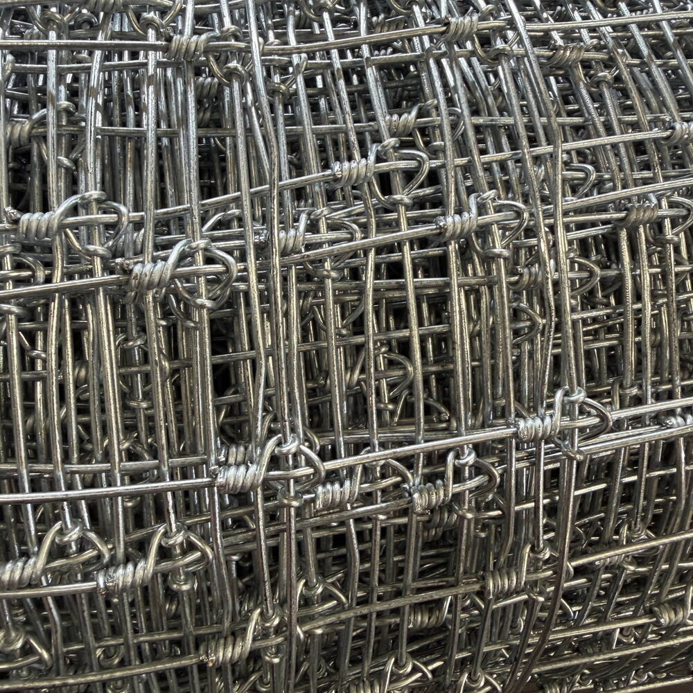 Graduated mesh hinge joint sheep and goat fence knot detail