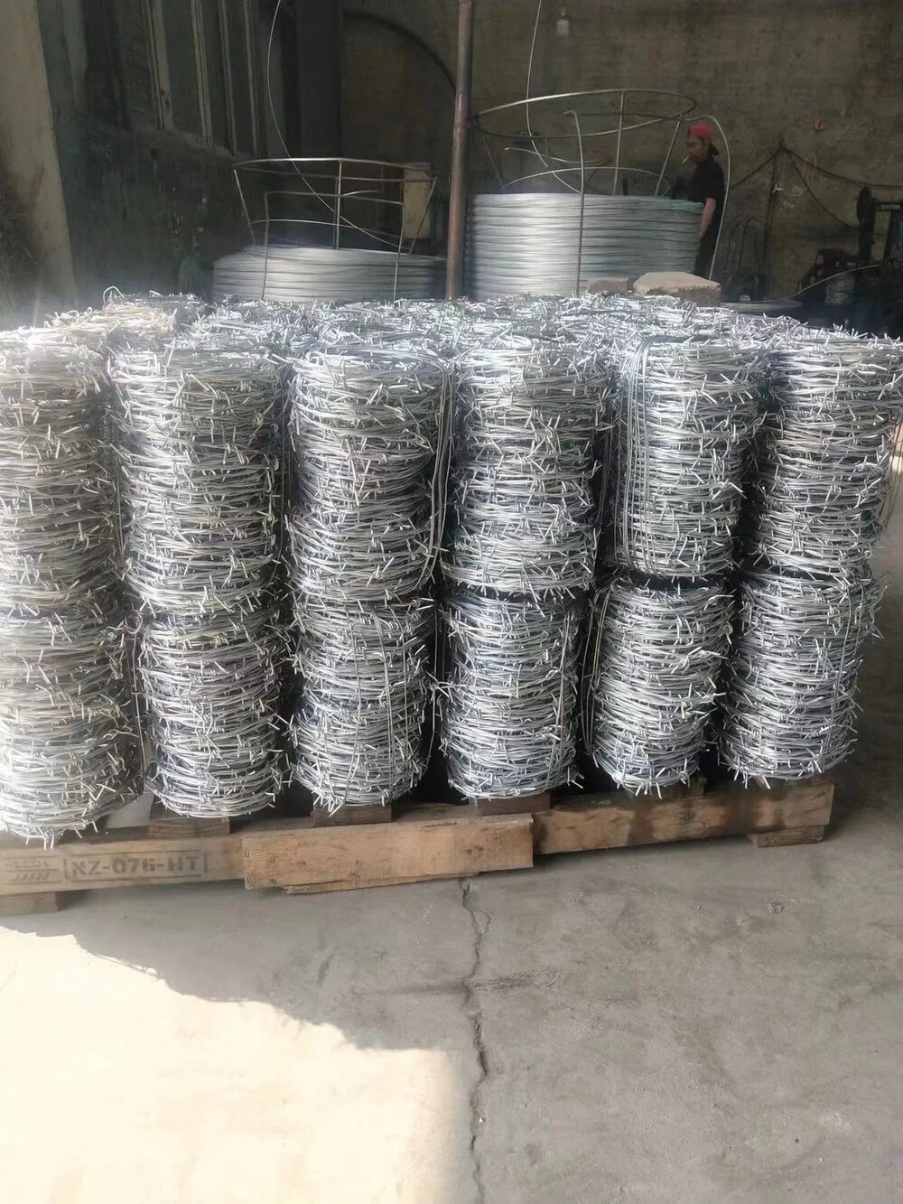 Galvanized barbed wire rolls for wholesale farm and livestock fencing supply